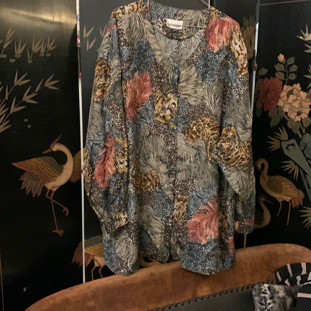 Polyester blouse feels like silk. 24W